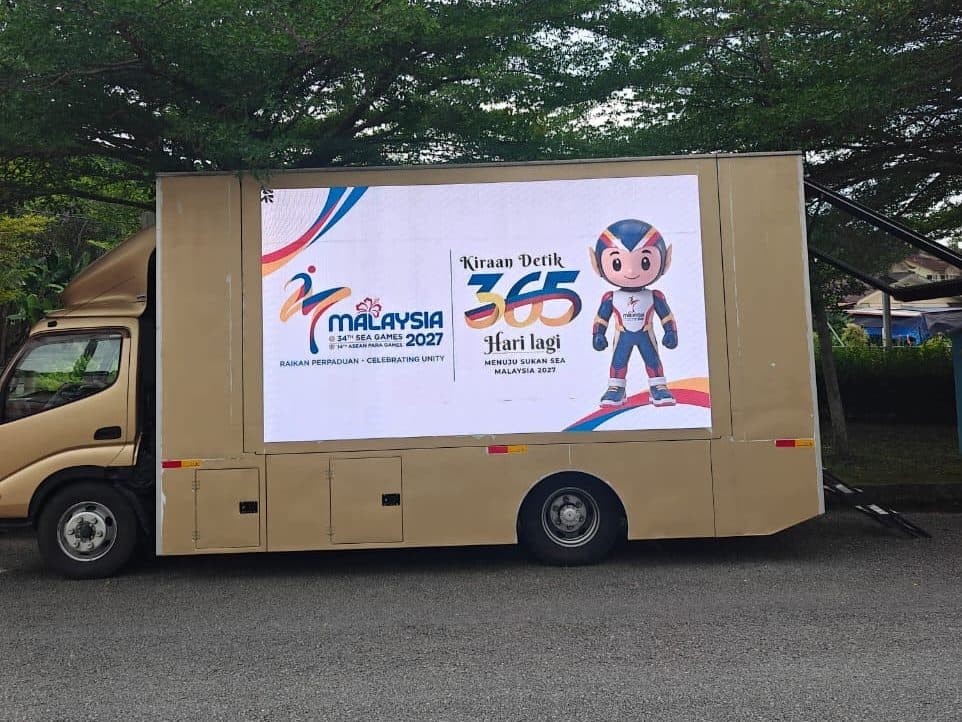 LED truck showing the 2027 Malaysia SEA Games countdown on Penang Island