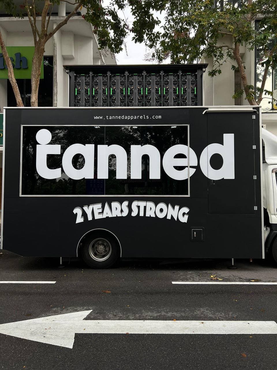Mobile LED advertising truck displaying a campaign at night